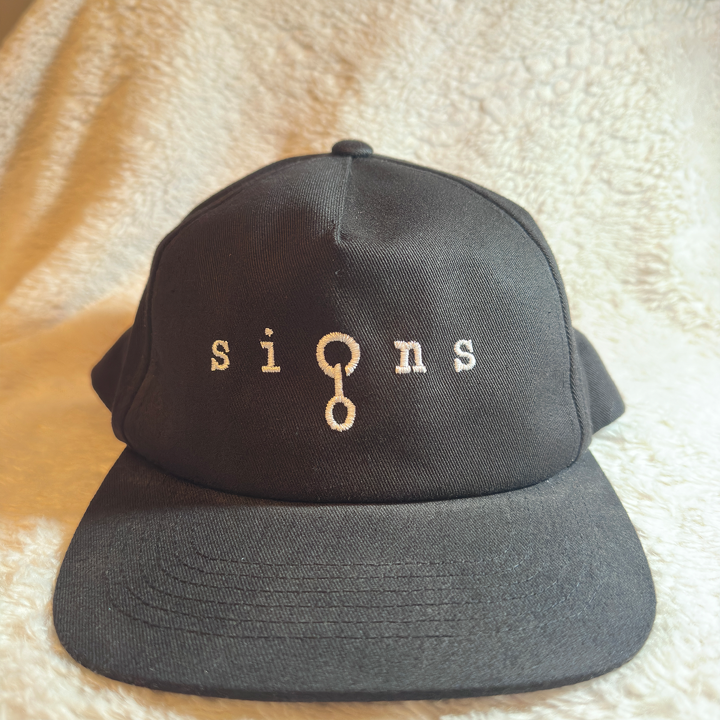 SIGNS • snapback